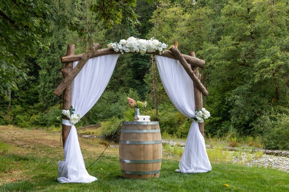 Arbor and wine barrel