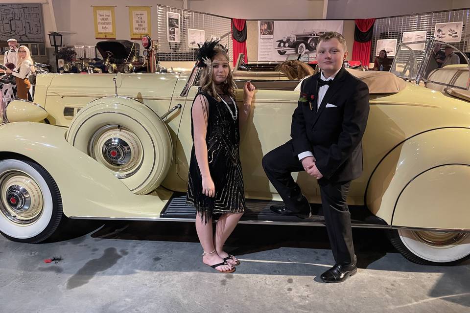 Couple with vintage car
