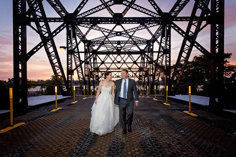 Couple walking on a bridge