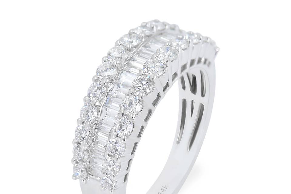 Estrella Lovely baguette diamonds channel-set along the band, surrounded on top and bottom with dazzling round accent diamonds. Diamond : 1.42 Carats ApproxCut: Round Brilliant & BaguetteColor: E-FClarity: VS-SIGold Karat: 14ktGold Color: White GoldGold Weight : 5.0gSize: 7 (54.4 MM)