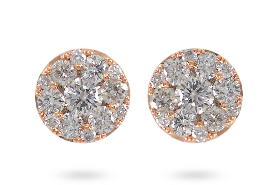 Blazing StarsCircle diamond stud earrings encrusted with round diamonds in a rose gold setting. Diamonds: 0.53 Carats Approx.CUT: Round BrilliantsCOLOR: F - GCLARITY: VS - SIGold Karat: 14kt.Gold Color: Rose GoldGold Weight: 2.0g