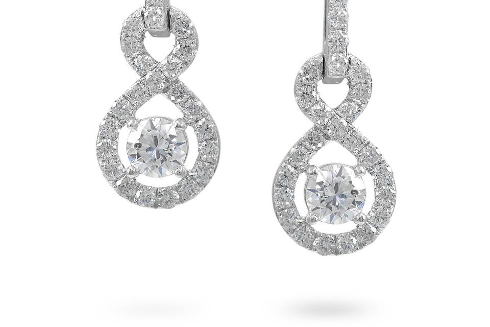 InfinitiExquisite diamond-laced drop earrings complete with luminous round diamonds in the middle. Diamond: 0.98 Carats Approx.Cut: Round BrilliantsColor: E - FClarity: VS - SIGold Karat: 14kt.Gold Color: White GoldGold Weight: 2.4g