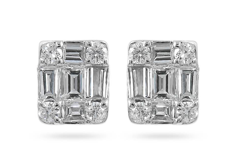 Crystella Rectangular studs adorned with brilliant baguette diamonds in a cross arrangement with round accent diamonds on each corner. Diamonds: 0.25 Carats Approx.Cut: Round Brilliant & BaguetteColor: F - GClarity: VSGold Karat: 14kt.Gold Color: White GoldGold Weight: 1.3g