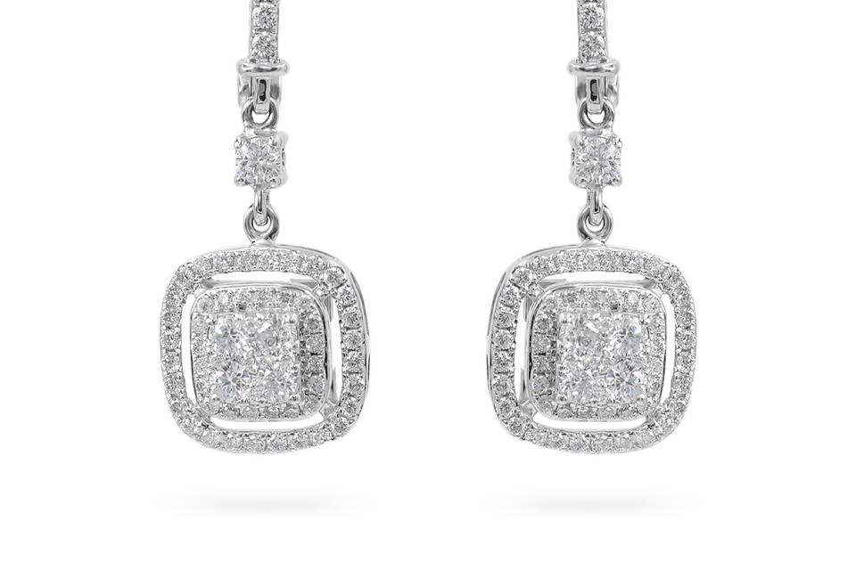 Grand Quadra LiniaPave diamond drop earrings dangle into a square setting with a square halo accent. Diamond : 0.80 Carats Approx.CUT:Round BrilliantsCOLOR:E-FCLARITY:VS - SIGold Karat: 14kt.Gold Color: White GoldGold Weight : 4.3g