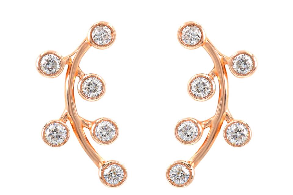 Twigs O' DiamondsCurved rose gold bar boasts of six round diamonds placed along its side like leaves on a branch. Diamond : 0.50 Carats Approx.Cut: Round BrilliantsColor: F-GClarity: VS - SIGold Karat: 14kt.Gold Color: Rose GoldGold Weight : 2.5g