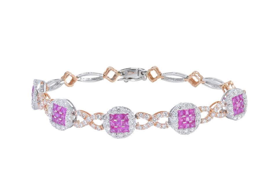 Princess Sparkling pink diamonds in a square setting encircled in brilliant pave diamonds, all linked together by prong set dazzling diamonds. Diamond : 1.92 Carats Approx.Cut: V.GOODColor: E - FClarity: SILength : 7