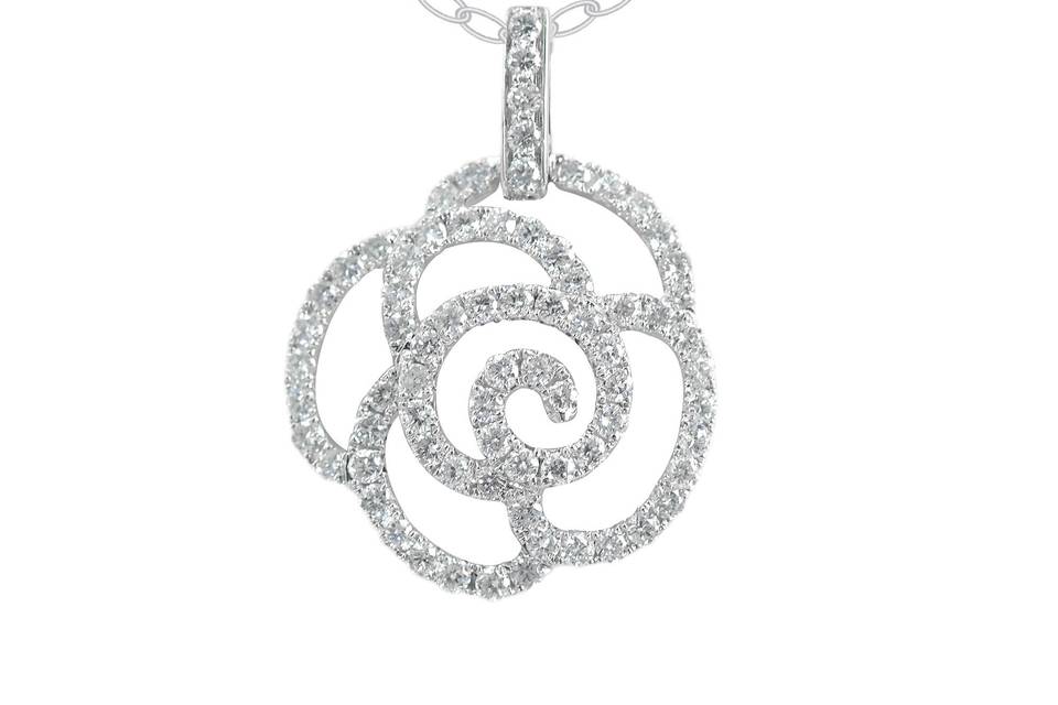 RosaMatching 14K Gold Chain FreeStunning drop pendant featuring numerous pave diamonds to illuminate the outline of a rose.Diamond : 0.66 Carats Approx.Cut : Round BrilliantsColor : E - FClarity : VSGold Karat : 14kt.Gold Color : White GoldGold Weight : 1.6g