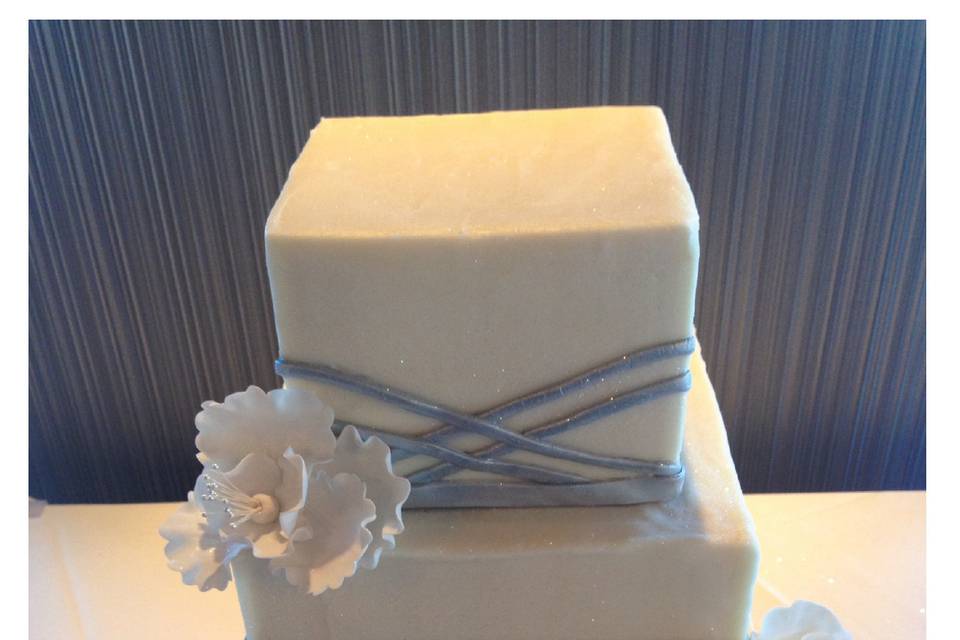 3 Tier Square Buttercream Wedding Cake with Silver Fondant Bands and Gumpaste Flowers by Delightful Treats Cakery