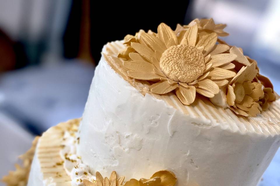 Gold Peacequinox Wedding Cake