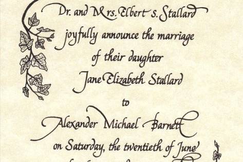 Italic calligraphy ivy framed wedding announcement on parchment