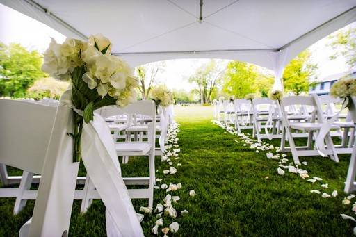 CEREMONY: white padded chairs