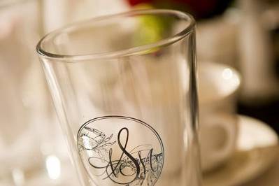 Abby & Mark's wedding favor, pint glasses printed with their monogram