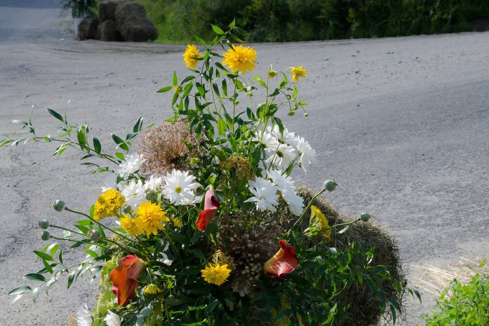 Delightful milk can vase