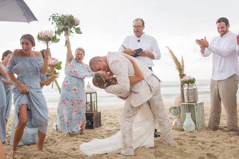 Almost got this wedding in before the downpour . . . emphasis on almost!  We got soaked but what a fun memory!  Matt Lusk got this great shot as the rain began to pour!