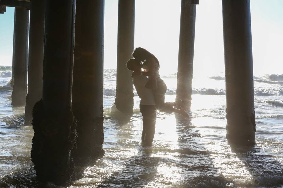 Couple kissing in creative shot