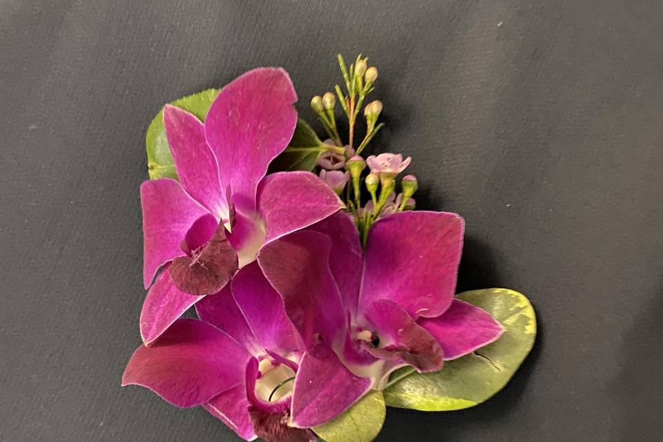 Vibrant orchid boutonnière