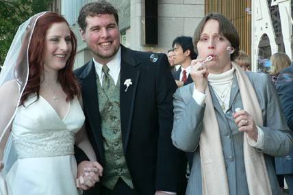 Bubbles to lighten the end of a formal wedding at the United Nations Chapel