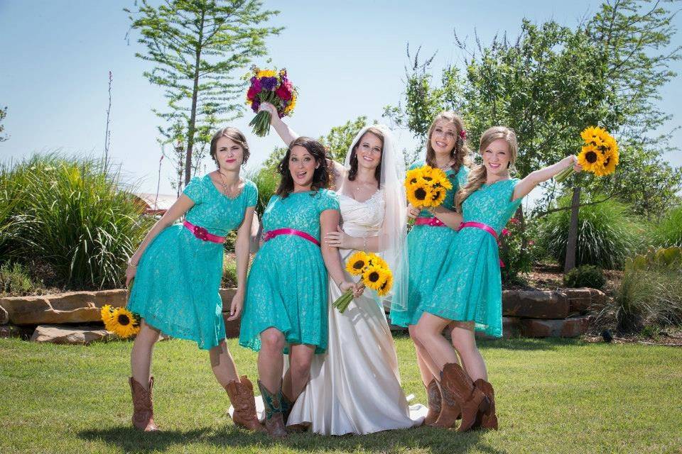 Bride with her bridesmaids in their boots