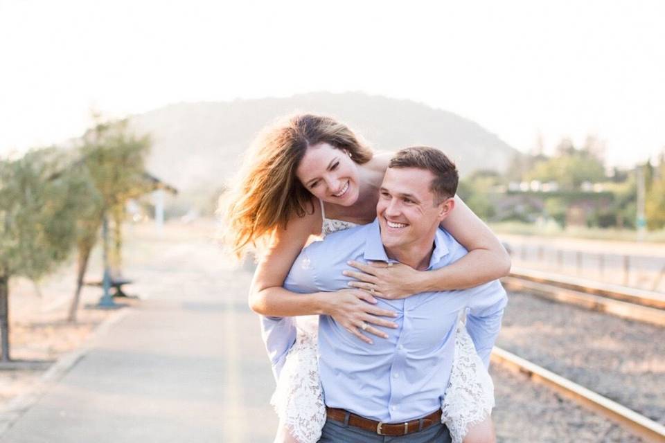 Happy couple walking on a road