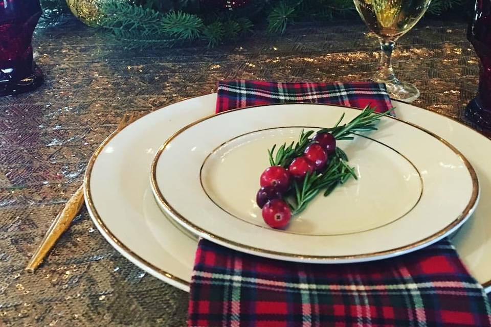 Table setting and plaid napkin