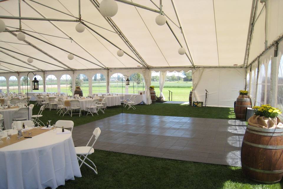 Outdoor dance floors can customize your venue. Wall options give you the choice of look and light/heat control of your venue.