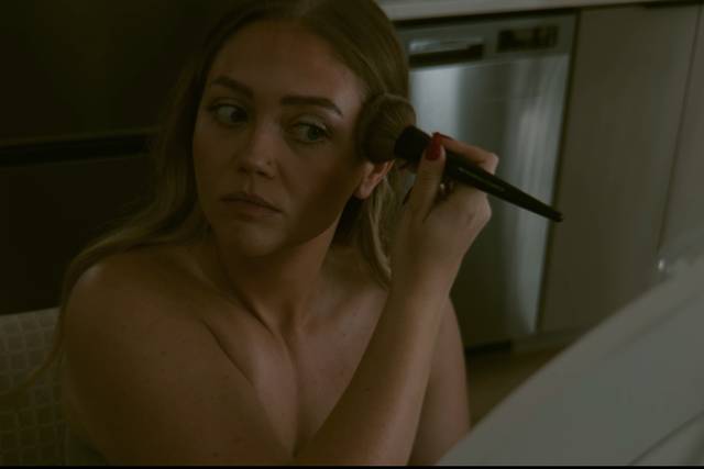 Putting on makeup