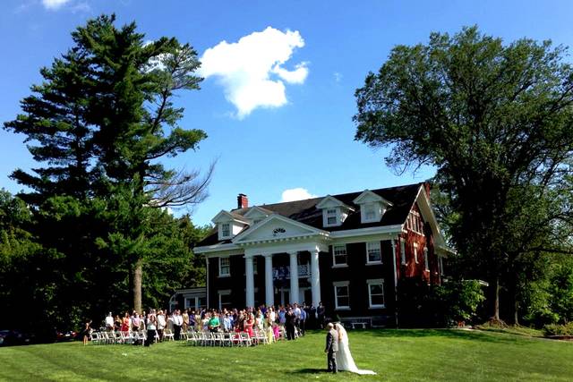 Our stately century-old Georgian colonial mansion will be a breathtaking backdrop for your special day!
