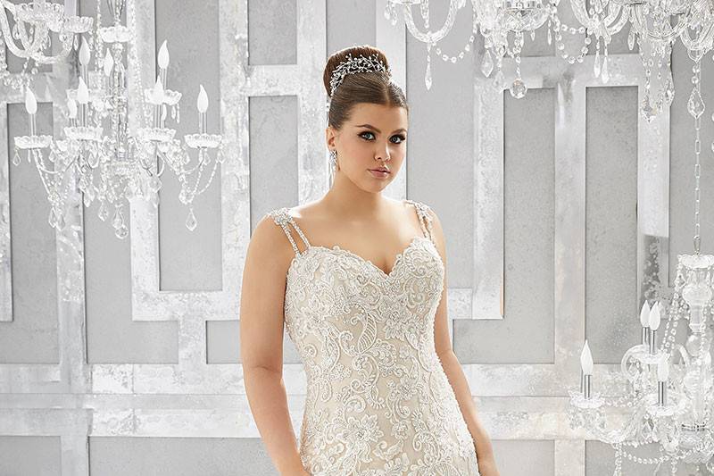 Musetta, Style 3221	Crystal Beaded, Embroidered Appliqués Adorn the Silhouette on This Tulle Mermaid Bridal Gown. A Layer of Sparkle Net Adds the Perfect Touch of Glam. Colors Available: White, Ivory, Ivory/Caramel.