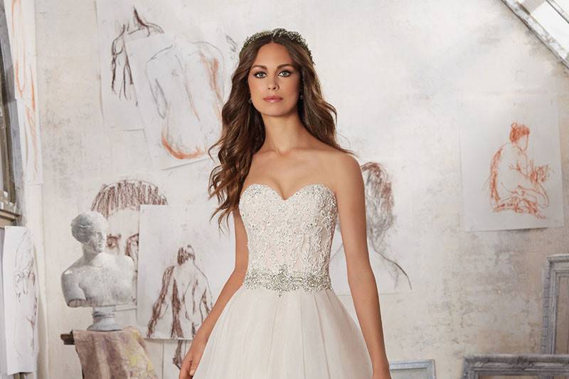 Marvella, Style 5511	Crystal Beaded Alen?çon Lace Appliqu?és Adorn the Bodice of This Delicate and Ethereal Organza Wedding Dress. A Jewel Waistline Adds the Perfect Touch of Sparkle. Available in: White, Ivory, Blush.