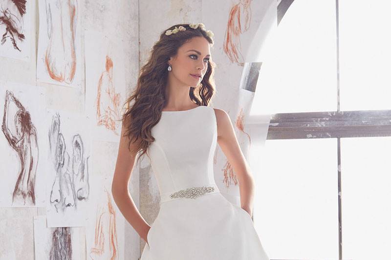 Maxine, Style 5516	Simple Yet Elegant, This Larissa Satin A-Line Bridal Gown Features a Jewel Beaded Belt and Straps. Pockets at the Hip. Colors Available: White/Silver, Ivory/Silver. Shown in Ivory/Silver.