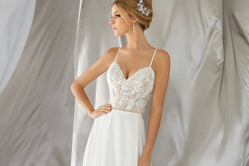 Mina, Style 6861	Intricate Crystal Beaded Embroidery Meets a Flowing, Soft Chiffon Skirt. Delicate Straps and Corset Style Back. Matching Satin Bodice Lining Included. Colors Available: White, Ivory, Ivory/Nude.