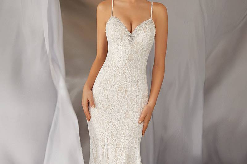 Moraia, Style 6868	Fun and Flirty, this Allover Alençon Lace, Slim Wedding Dress Features a Diamanté and Crystal Beaded Neckline and Back Strap Detail. Colors Available: White, Ivory, Ivory/Light Gold.
