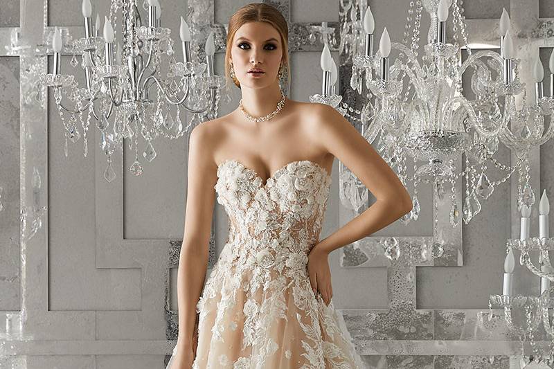 Meadow, Style 8171	Strapless Soft Tulle Ball Gown with Sweetheart Neckline & Embroidered Lace Appliqués. 3D Flowers Accent the Bodice & Cascade Down the A-Line Skirt. Colors Available: White, Ivory, Nude.