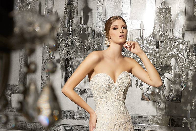 Marquerit, Style 8172	Intricate Re-Embroidered Lace Appliqués & Crystal Beading Adorn the Sweetheart Bodice on this Breathtaking Wedding Dress. A Flounced Tulle Mermaid finished with Horsehair Trim.