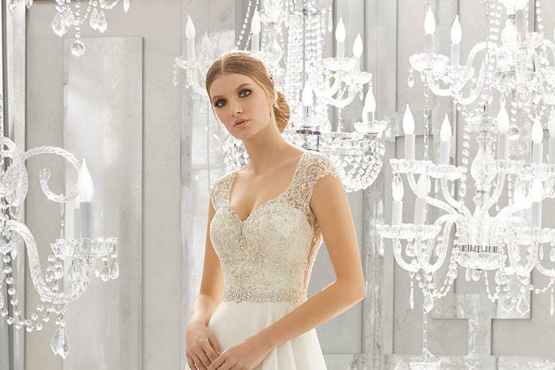 Mollie, Style 8182	Diamanté and Crystal Beaded Embroidery Adorn the Bodice of This Silk Chiffon Wedding Dress. A Removable Beaded Organza Belt, Style 11262, and Open Back. Available in: White, Ivory, Ivory/Champagne.