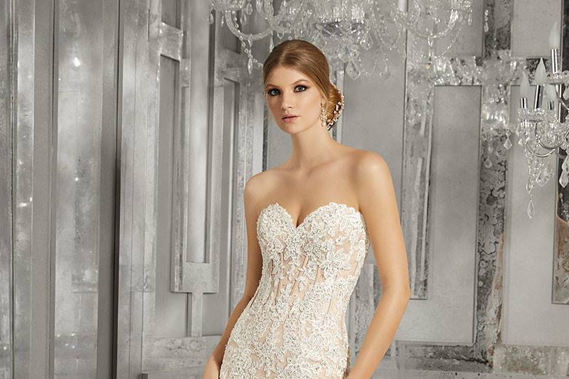 Morella, Style 8185	This Stunning Mermaid Sweetheart Neckline Wedding Gown Features Crystal Beaded Alençon Lace Appliqués, Exposed Boning, and an Exquisite Scalloped Hemline. Colors Available: White, Ivory, Ivory/Nude.