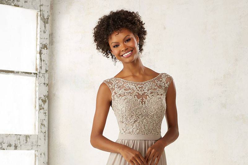 Style 21522	Ornate Embroidery and Beading Accentents the Illusion Bodice on This Elegeant Chiffon Bridesmaids Dress. Open V Back with Zipper Closure. Shown in Latte. Available in 15 colors.