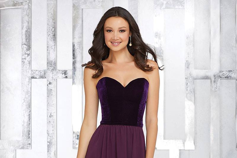 Style 21540	A Beautifully Fitted Strech Velvet Bodice and Flowy Chiffon Skirt Perfectly Compliment Each Other on This Full Length Sweetheart Neckline Bridesmaids Dress. Available in 4 colors. Shown in Plum.