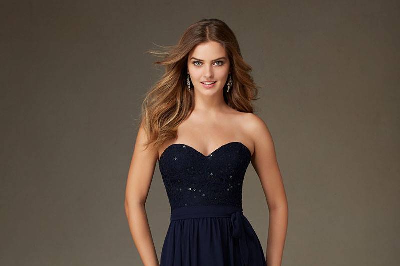 Style 128	Beaded Lace Bodice Bridesmaid Dress with a Sweetheart Neckline and flowy chiffon skirt Designed by Madeline Gardner. Shown in Navy. Available in 13 colors.