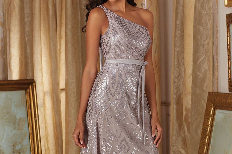 Style 20486		Morilee Patterned Metallic Sequins on Mesh Bridesmaid Dress.  One Shoulder, Full Long Length.  Matching Tie/ Sash Included.  Available in Blush, Champagne, Navy, and Taupe.