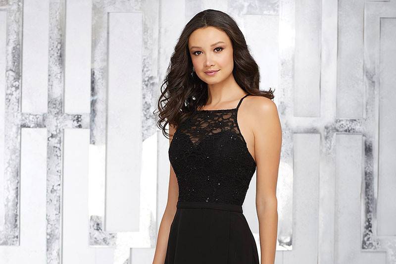 Style 21542		A Delicately Beaded Lace Bodice with thin straps and Chiffon A-Line Skirt Create The Perfect Bridesmaids Look. Criss Cross Back Straps Complete the Look. Available in 13 colors. Shown in Black.
