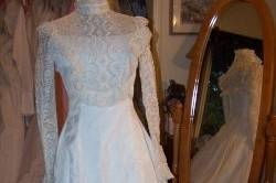 This vintage wedding dress was redesigned into the Scarlett dedication gown