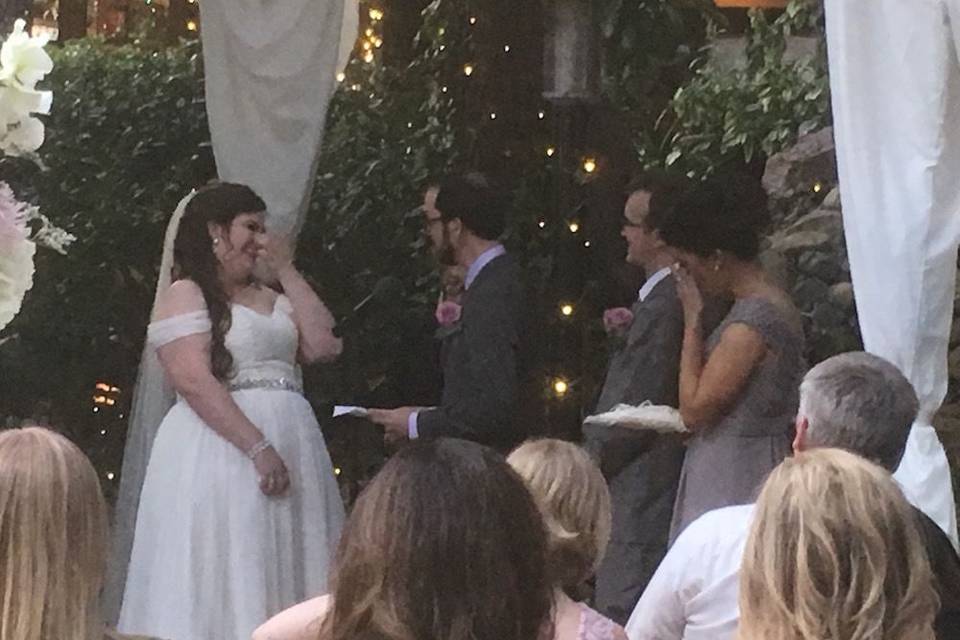 DJ Craig helping the ring bearer with his toast