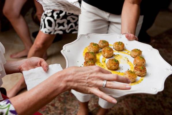 Smoked Salmon Puffs with Dill Creme elegantly passed to guests