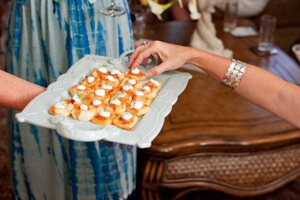 Smoked Salmon Puffs with Dill Creme elegantly passed to guests