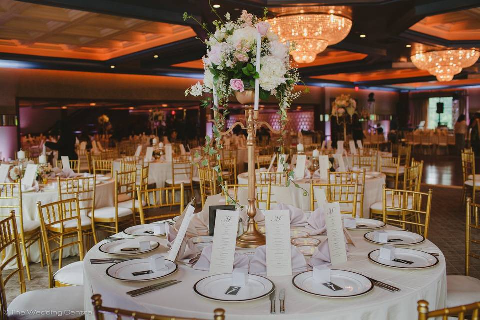 White table setup with centerpiece