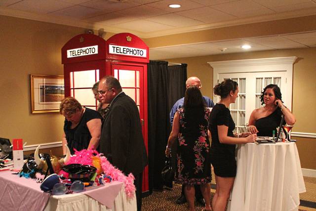 Guests trying the booth