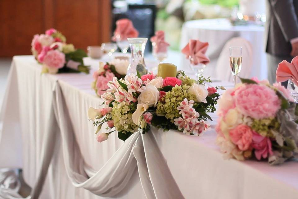 Long table setup with flowers