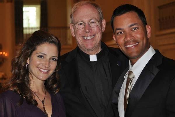 Newlyweds and the officiant