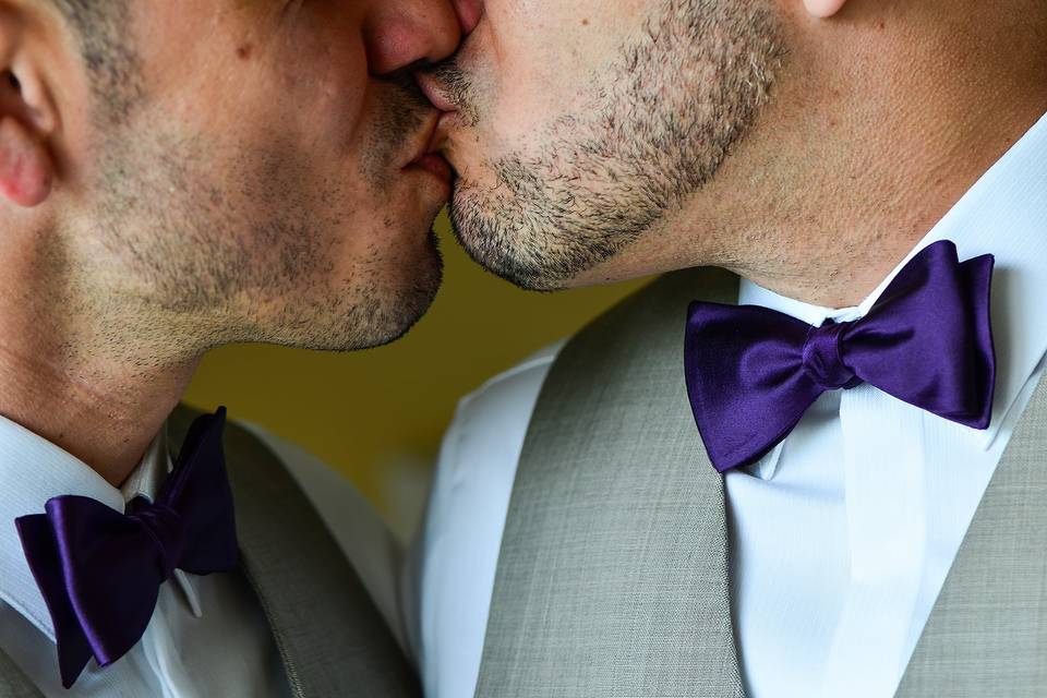 Grooms Kiss up close
